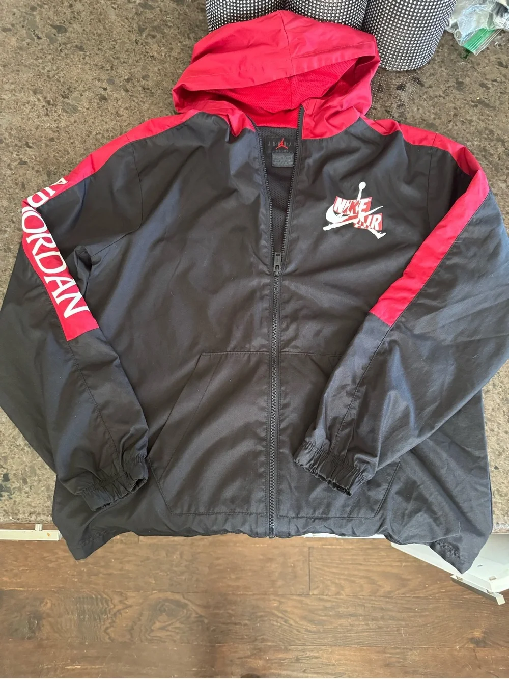 Jordan Black and Red Hooded Windbreaker with Air Jordan Sleeve Logo